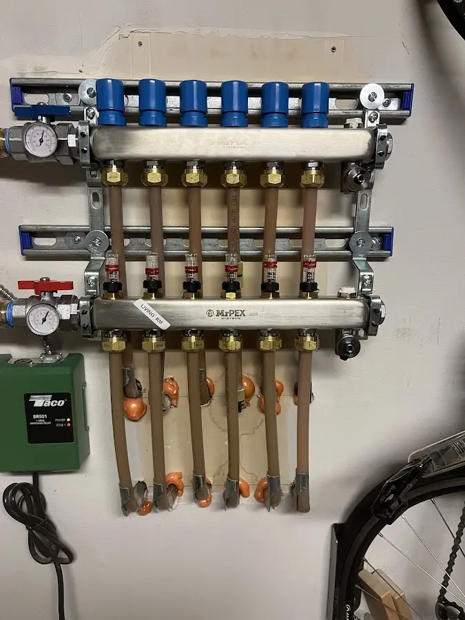 Plumber performing Gas Line Installation at a residential property in Parkland